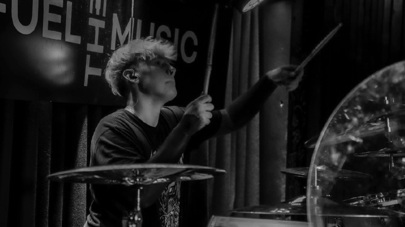 Diggity Glover behind the kit during a live performance