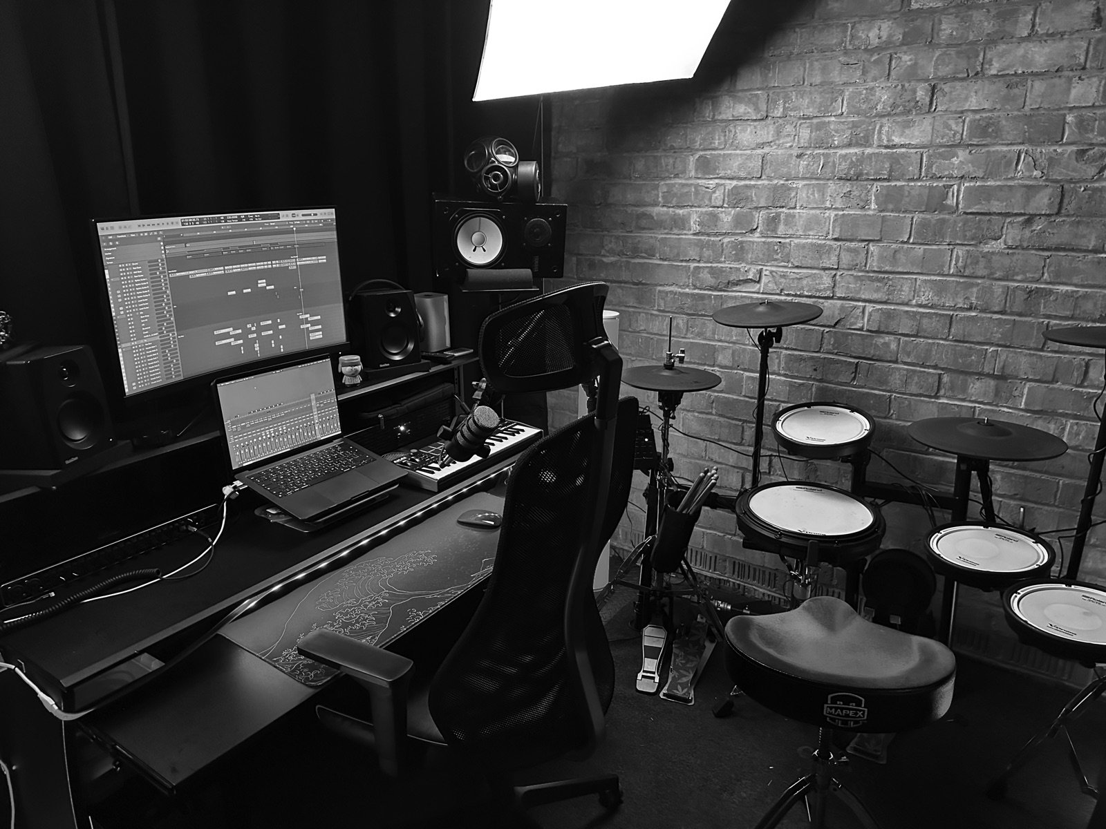 Recording studio with mixing desk, monitors and electronic drum kit